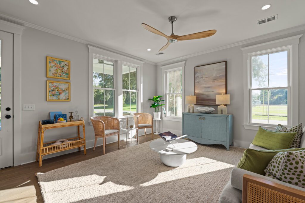 Custom coastal cottage at 2200 National Street in Beaufort, South Carolina, featuring Lowcountry architecture, a welcoming front porch, and luxury craftsmanship by Allen Patterson Builders.