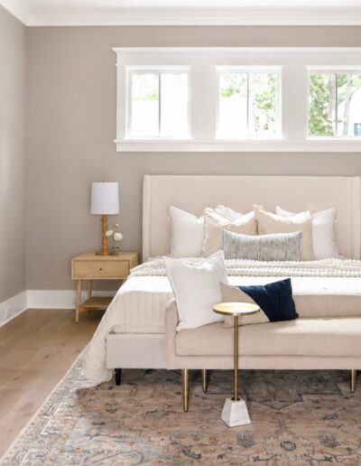 Primary bedroom suite at 4 Harborview Circle featuring hardwood floors, abundant natural light, and elegant Lowcountry design