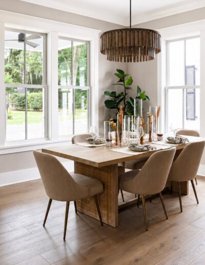 Designer kitchen and dining area at 4 Harborview Circle featuring custom cabinetry, a large island, and open-concept Lowcountry living