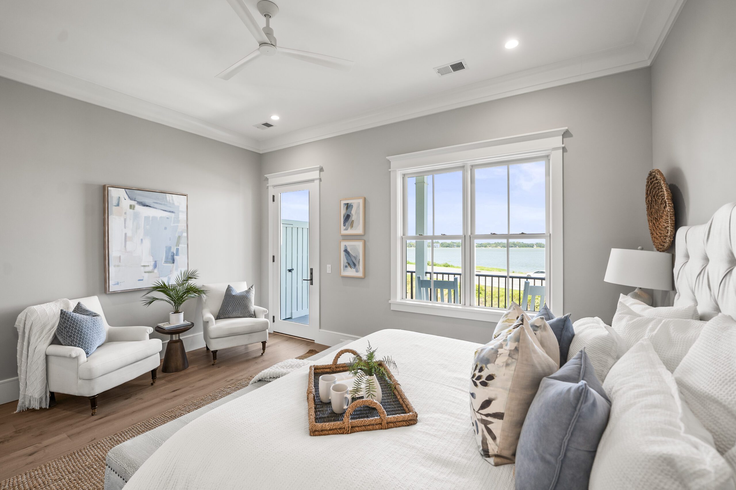 whitehall-point-townhome-interior-beaufort-sc Luxury townhome interior at Whitehall Point in Beaufort, South Carolina, featuring an open-concept living space, hardwood floors, natural light, and custom craftsmanship by Allen Patterson Builders.