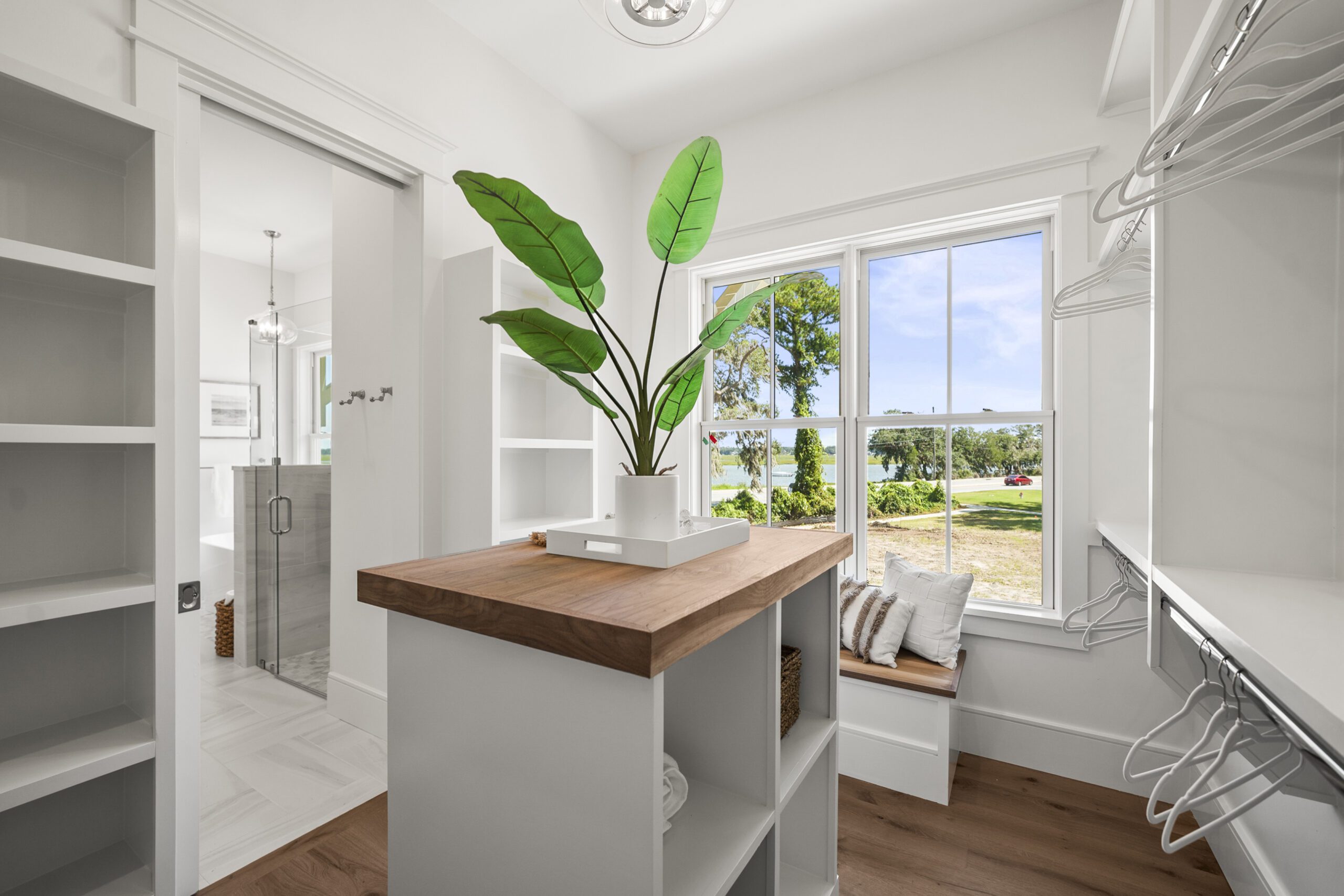 whitehall-point-townhome-interior-beaufort-sc Luxury townhome interior at Whitehall Point in Beaufort, South Carolina, featuring an open-concept living space, hardwood floors, natural light, and custom craftsmanship by Allen Patterson Builders.