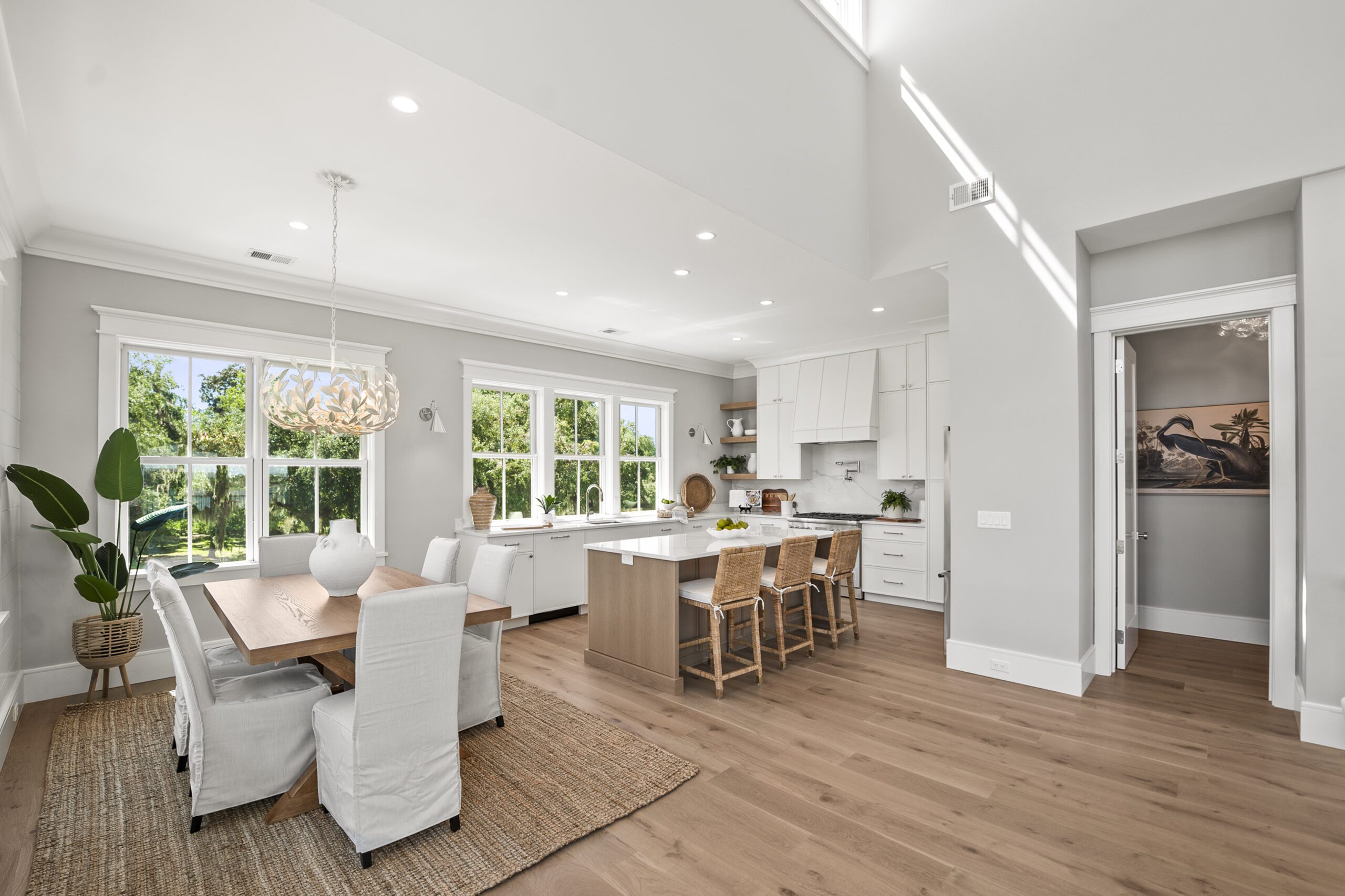 whitehall-point-townhome-interior-beaufort-sc Luxury townhome interior at Whitehall Point in Beaufort, South Carolina, featuring an open-concept living space, hardwood floors, natural light, and custom craftsmanship by Allen Patterson Builders.