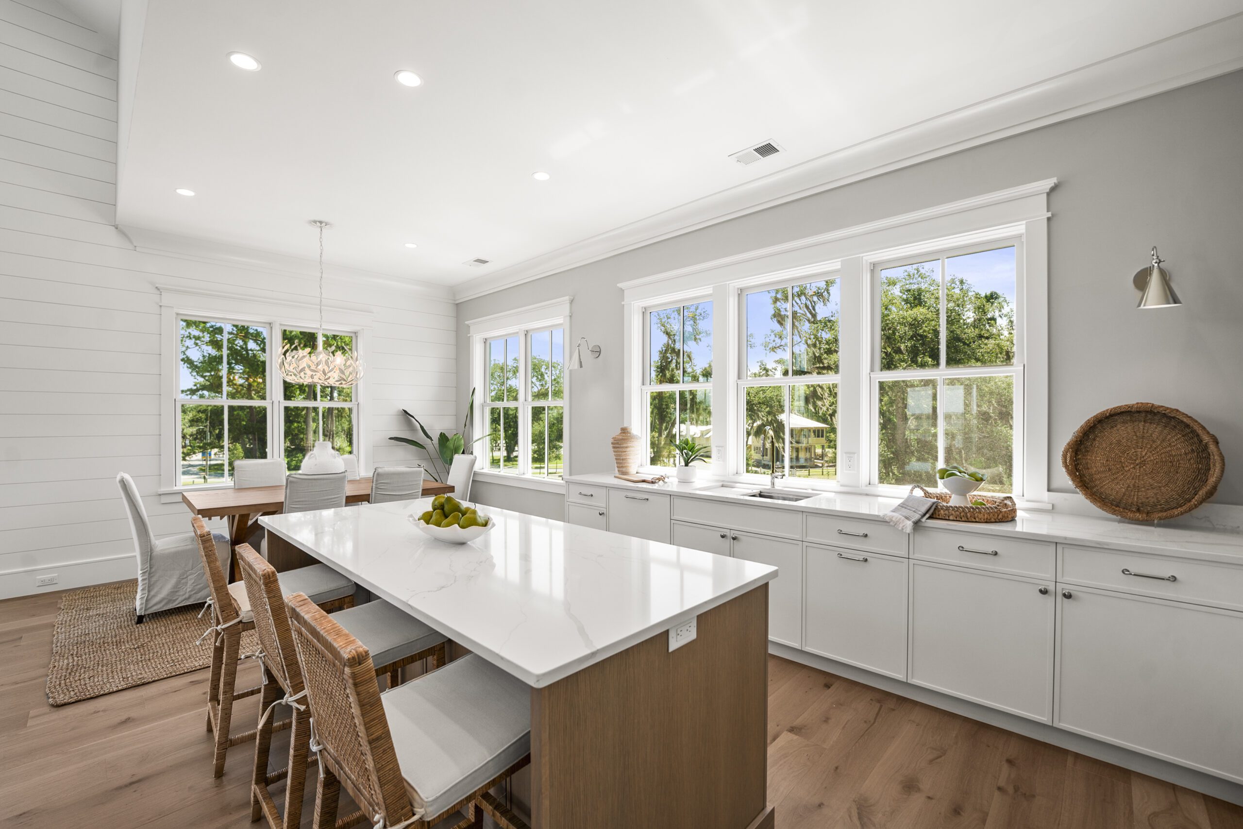 whitehall-point-townhome-interior-beaufort-sc Luxury townhome interior at Whitehall Point in Beaufort, South Carolina, featuring an open-concept living space, hardwood floors, natural light, and custom craftsmanship by Allen Patterson Builders.